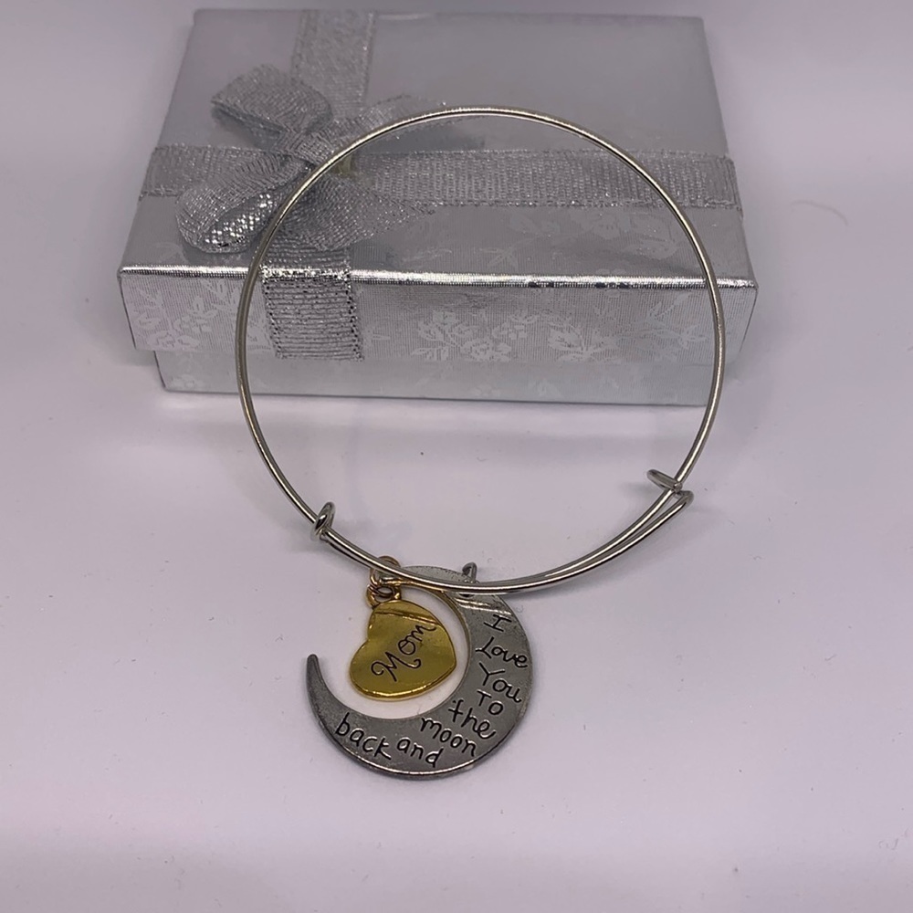 Gold and silver tone mom bracelet.